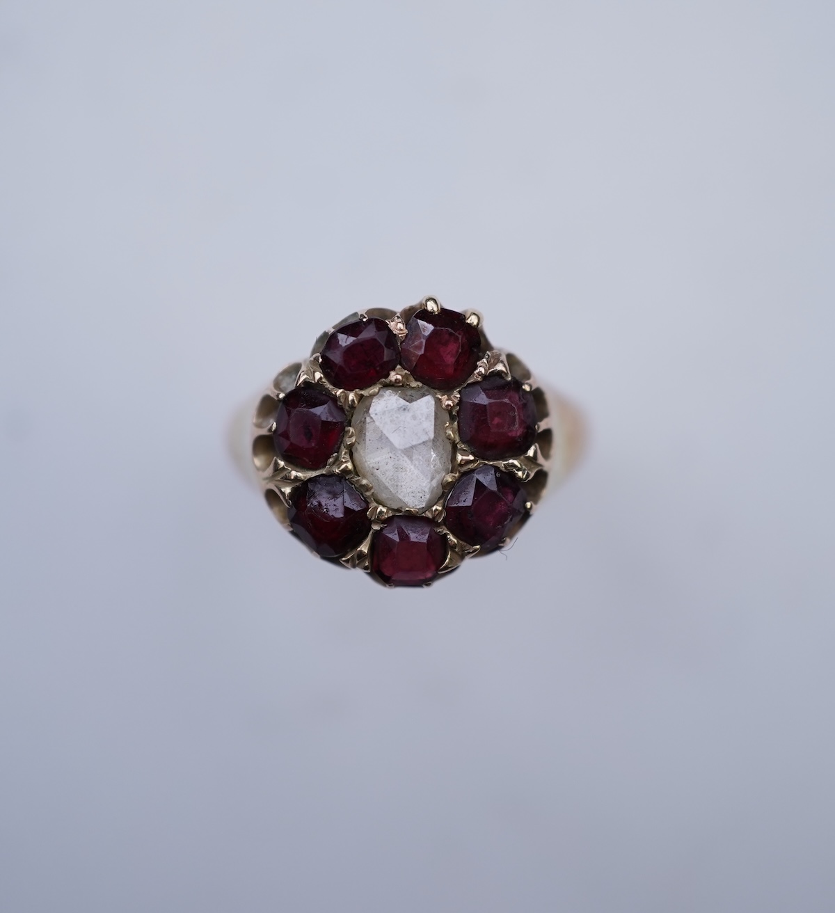 A garnet and diamond ring, late 19th century